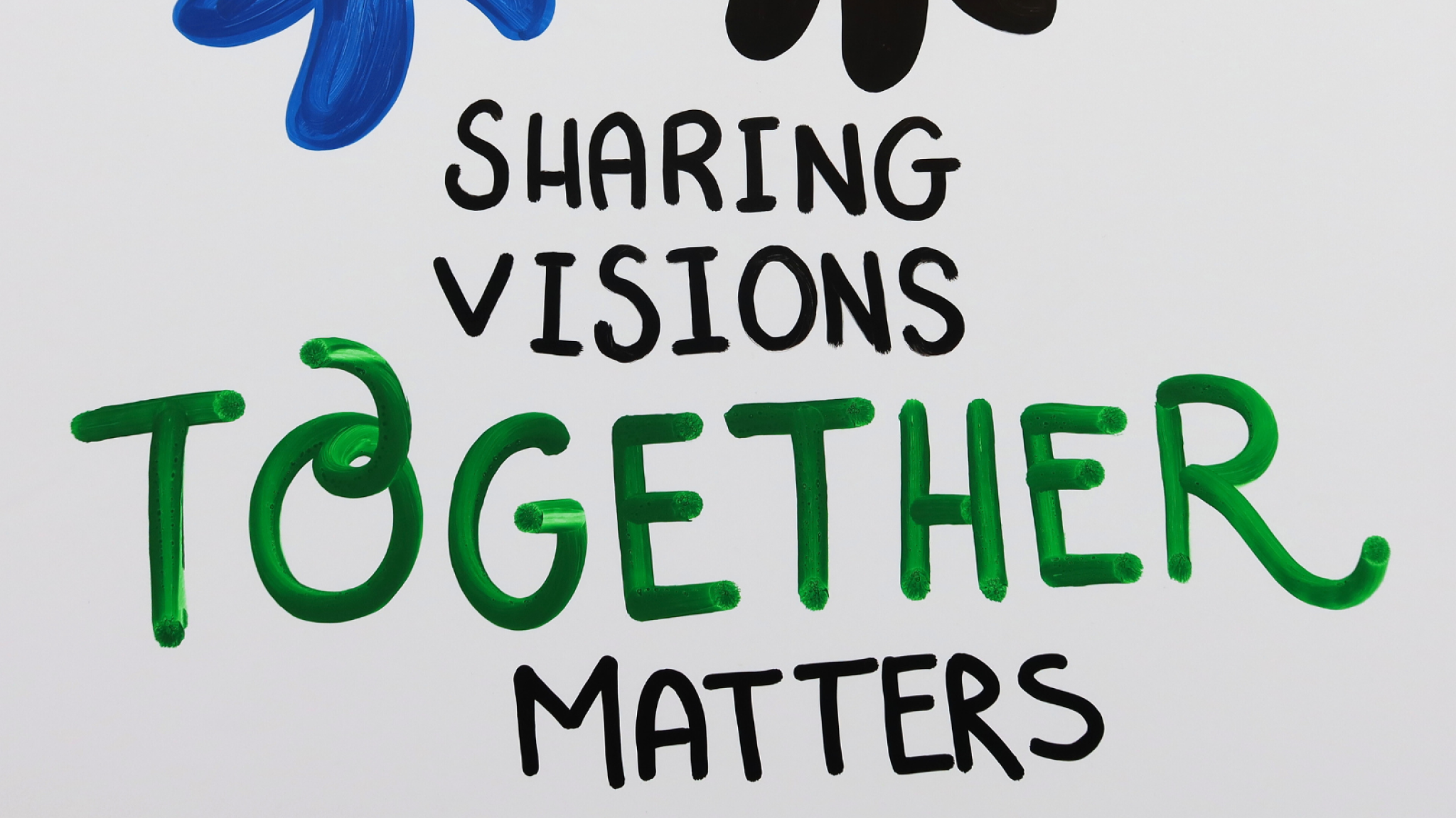 Close-up on an illustration from the event with the words 'Sharing visions together matters'.